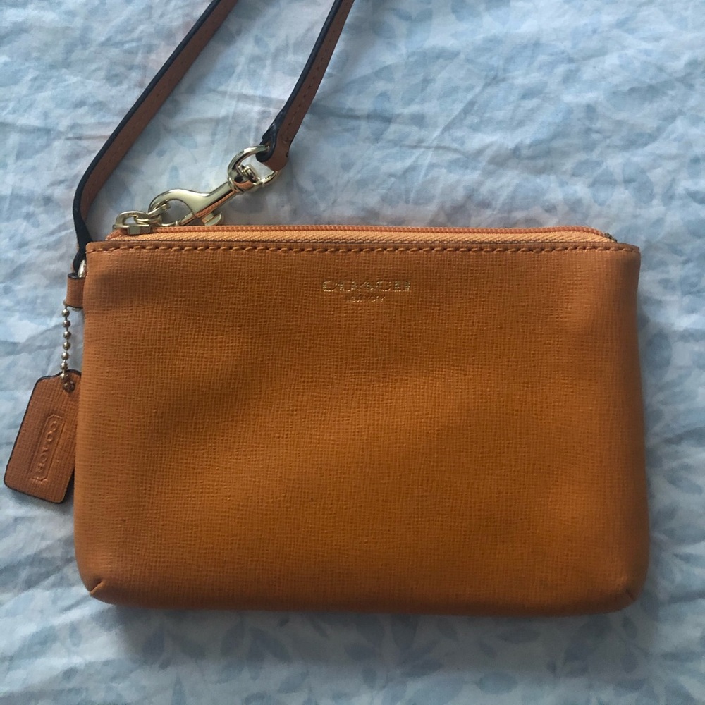 COACH mustard/yellow wristlet